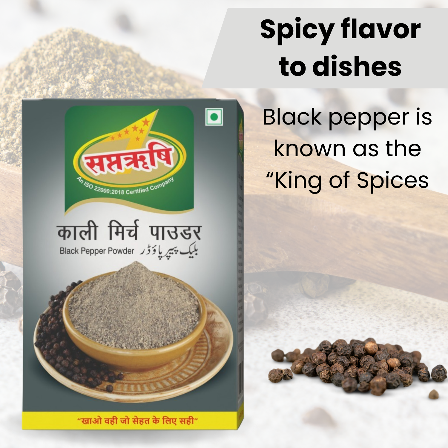SAPTRISHI Black Pepper Powder placed next to a spice tray